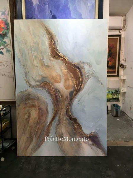 Flowing neutral abstract with gold-colored ridges