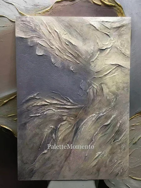 Gray and cream relief painting
