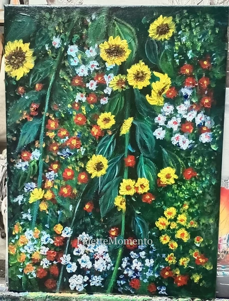 Yellow sunflowers and small red and white flowers on a deep green painted canvas