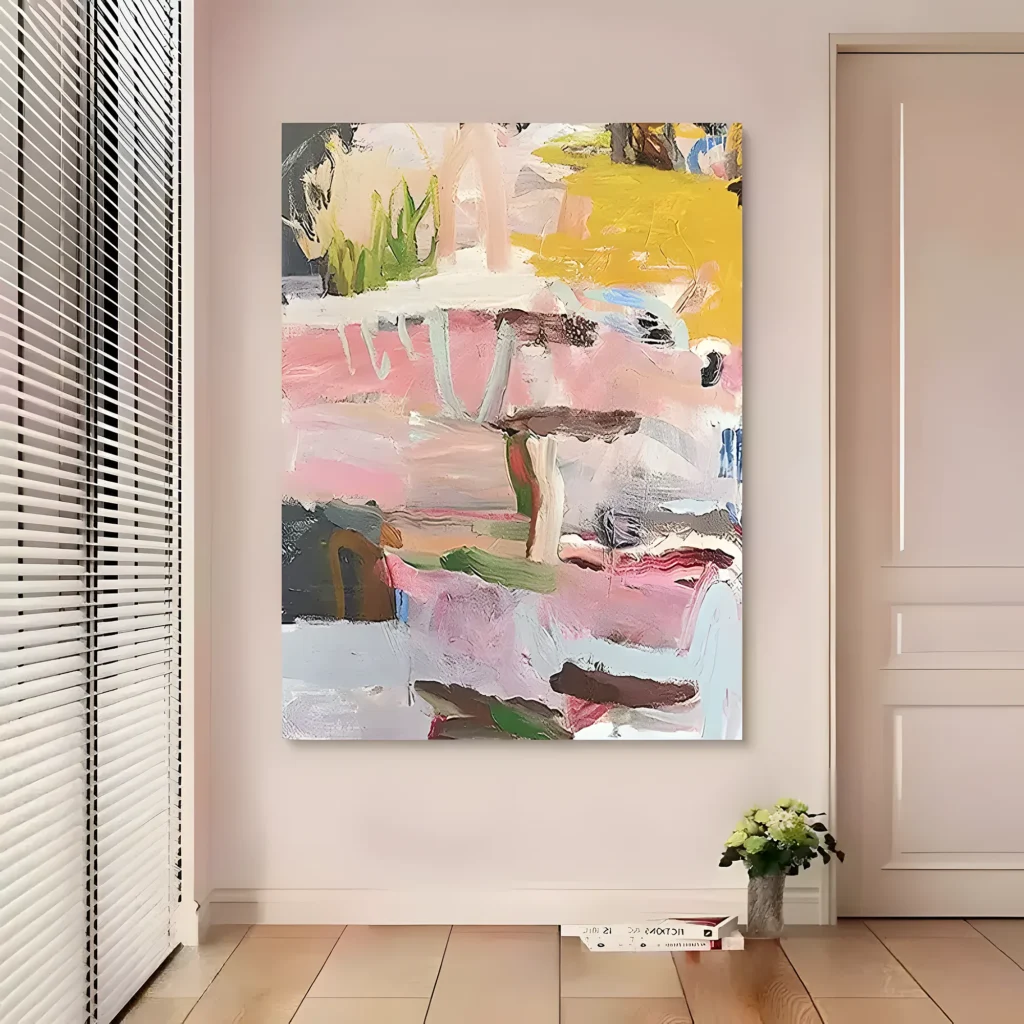Pink and mustard abstract floral wall art with loose green stems and brushy rose bands, hung in an entryway between white slatted shutters and a paneled blush door, with a small flower pot on the light oak floor