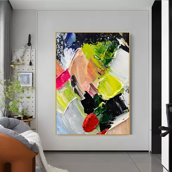 Bright green and red palette-knife abstract painting displayed as framed wall art in a modern living room