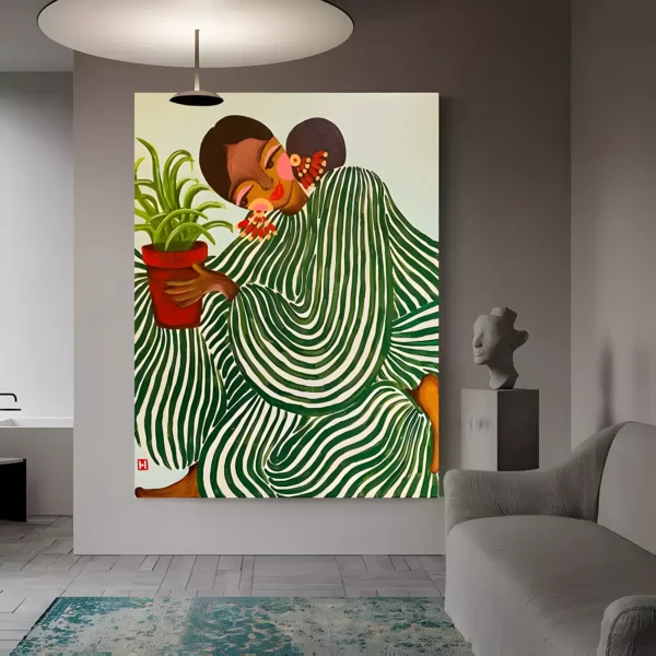 Green and white wall art of a woman in a striped robe cradling a potted spider plant while a second figure leans into her cheek, hung in a modern gray living room with a stone bust on a pedestal and a teal rug