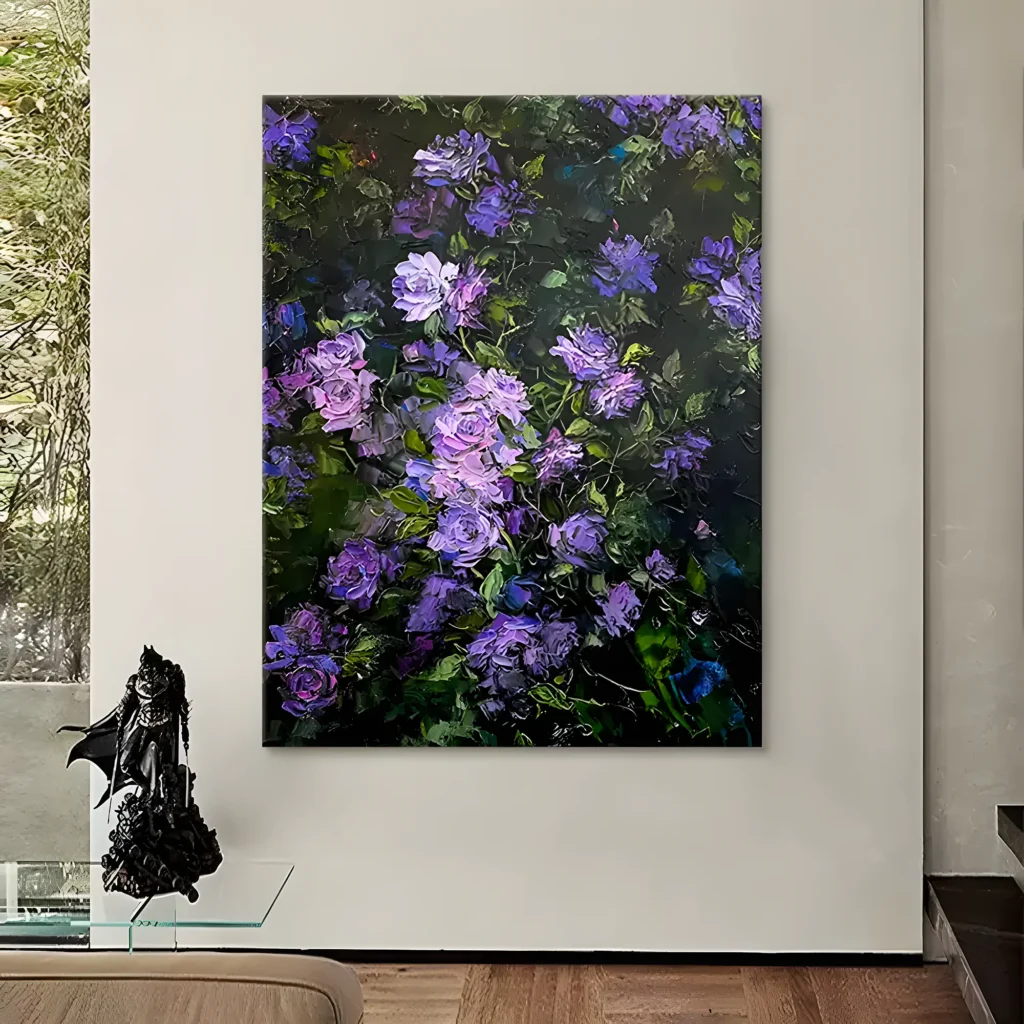 Painting of violet and lilac roses climbing through dark leafy shadows in thick paint, displayed on a pale gallery wall beside a full-height garden window and a black sculptural figurine on a glass shelf
