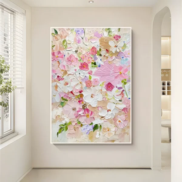 Soft pink cherry blossom impressionist painting displayed as framed wall art in a modern living room
