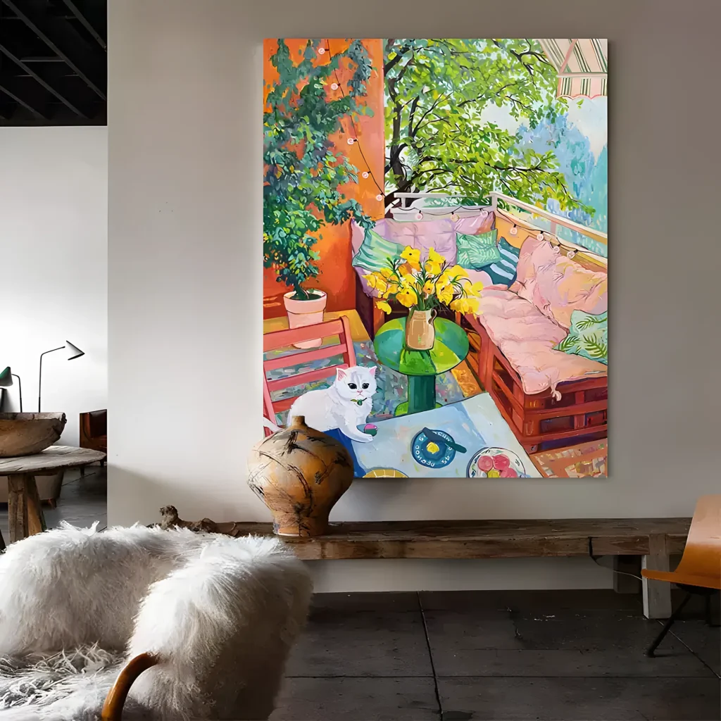 Sunlit balcony with a white cat fauvist painting displayed as framed wall art in a bright living room