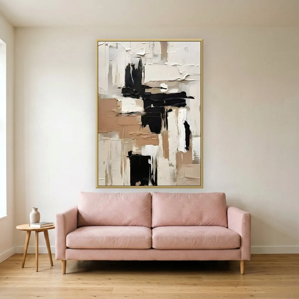 Cream and charcoal impasto plasterwork abstract canvas painting displayed as framed wall art in a blush pink modern living room