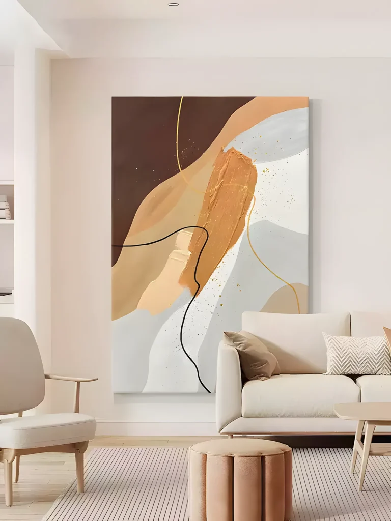 Soft terracotta and gray organic wabi-sabi painting displayed as framed wall art in a bright living room