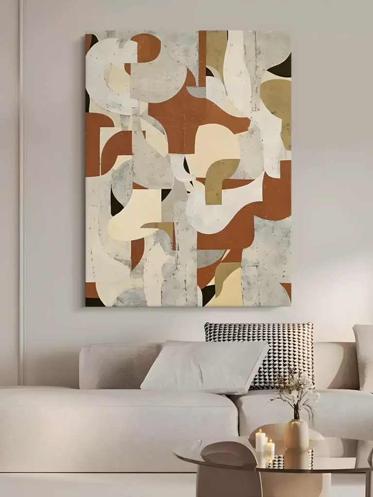 Brown and rust earthy organic wabi-sabi painting displayed as framed wall art in a bright living room