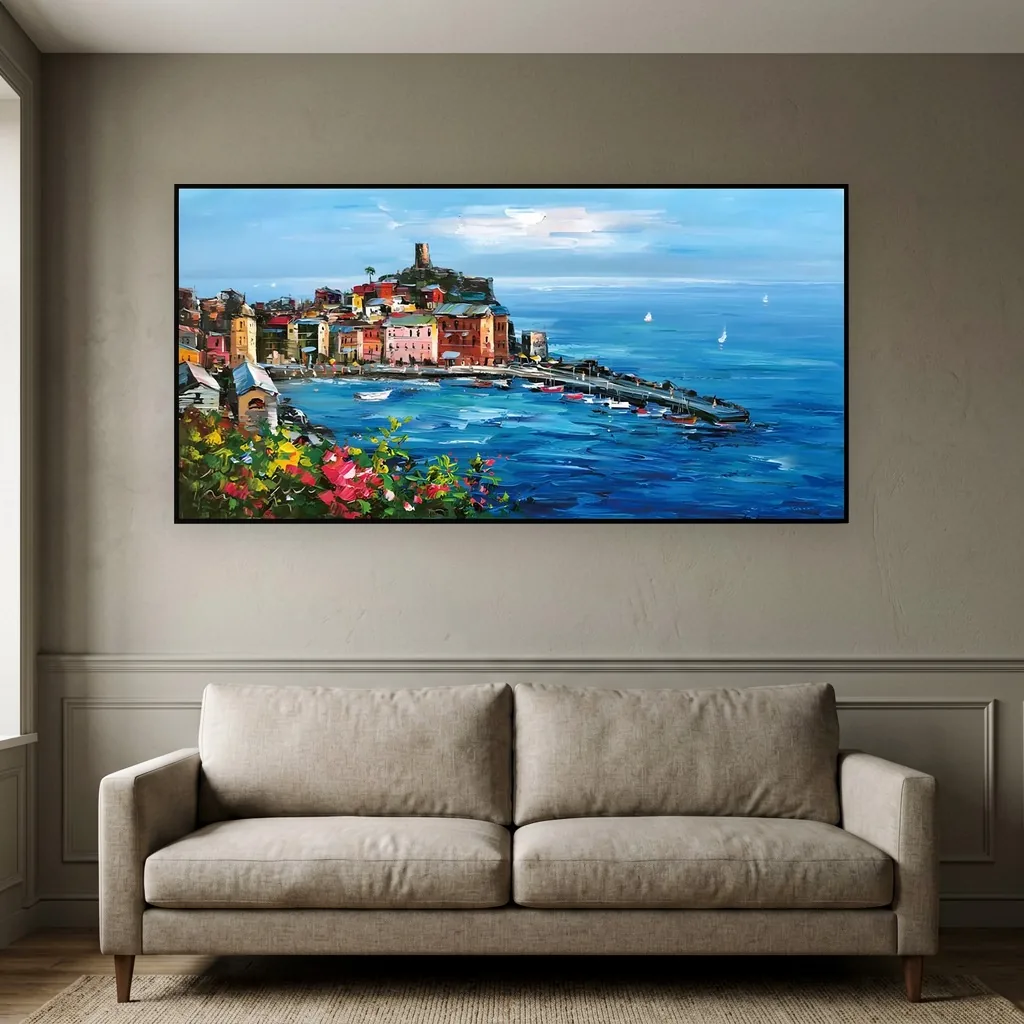 Turquoise and coral coastal village impressionist canvas painting, shown above a sofa in an elegant traditional living room