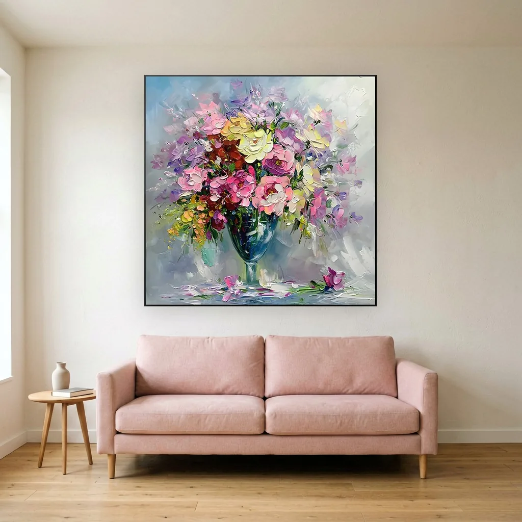 Rose pink and cream bouquet in a teal glass vase, petals dropped at its base, a palette-knife canvas on a warm white wall