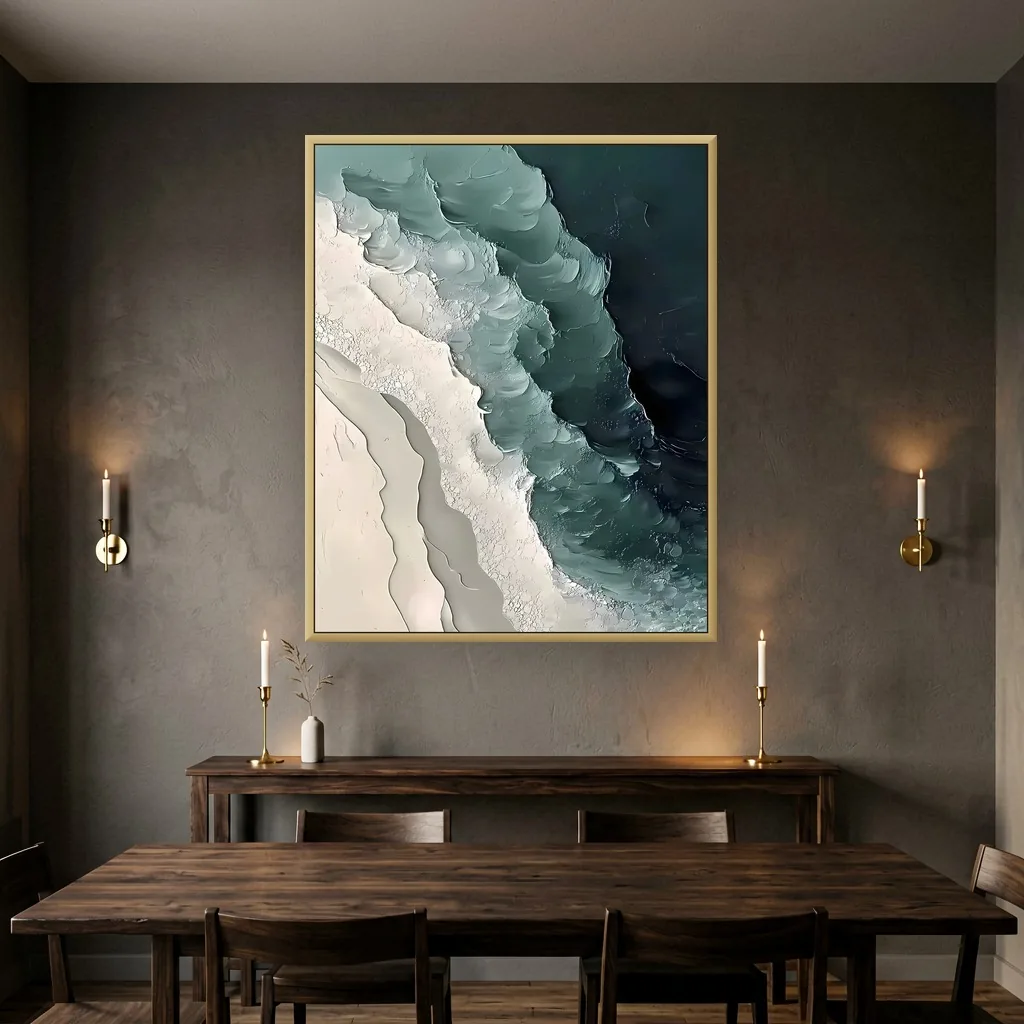 Teal and white coastline seascape 3D textured relief canvas painting, shown above the table in a moody dining room