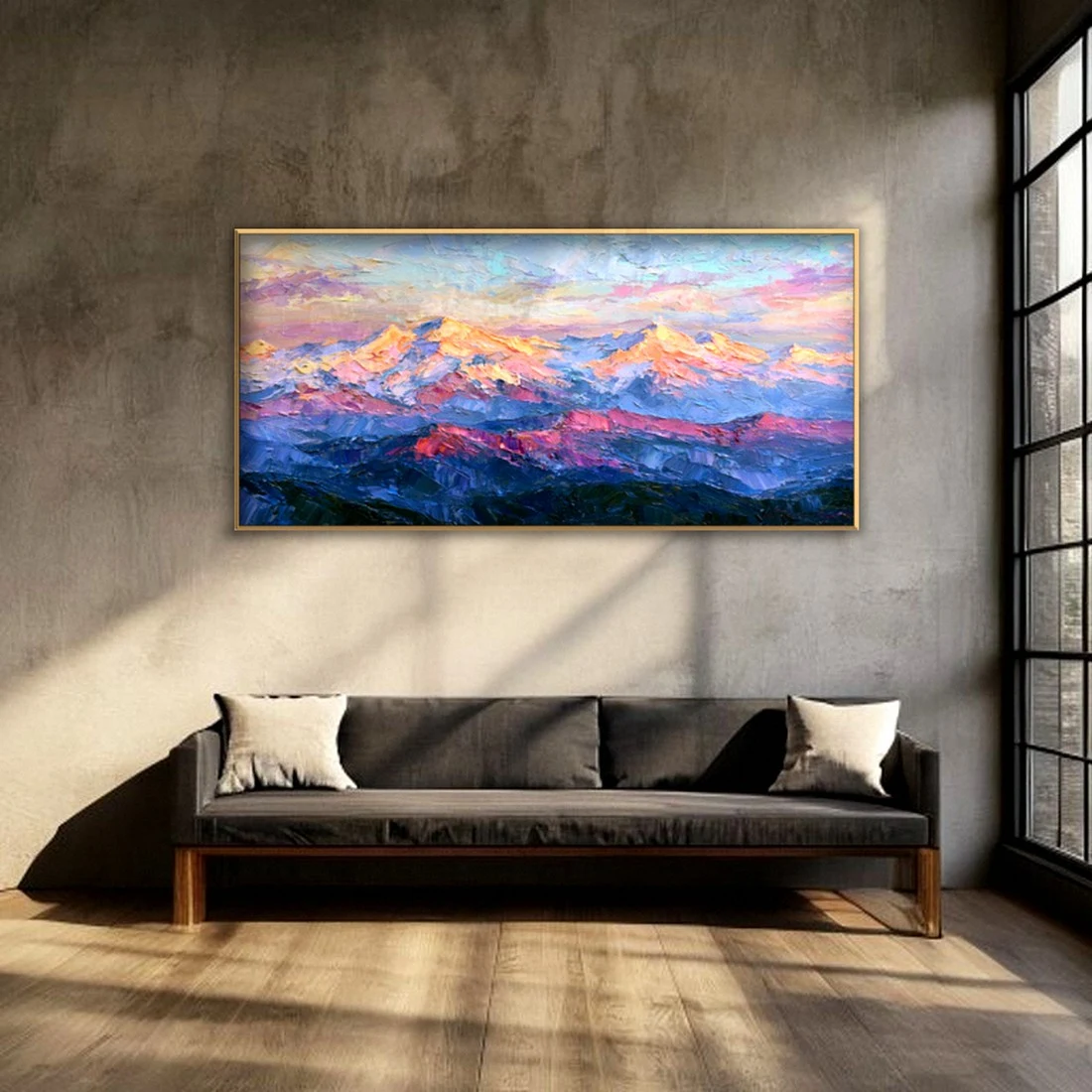 Pink alpenglow snowy mountains canvas in a moody living room