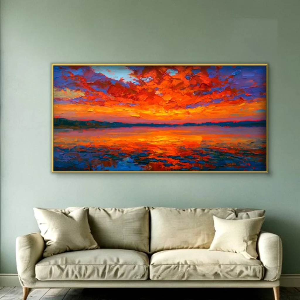 Blazing red sunset clouds over water canvas in a living room