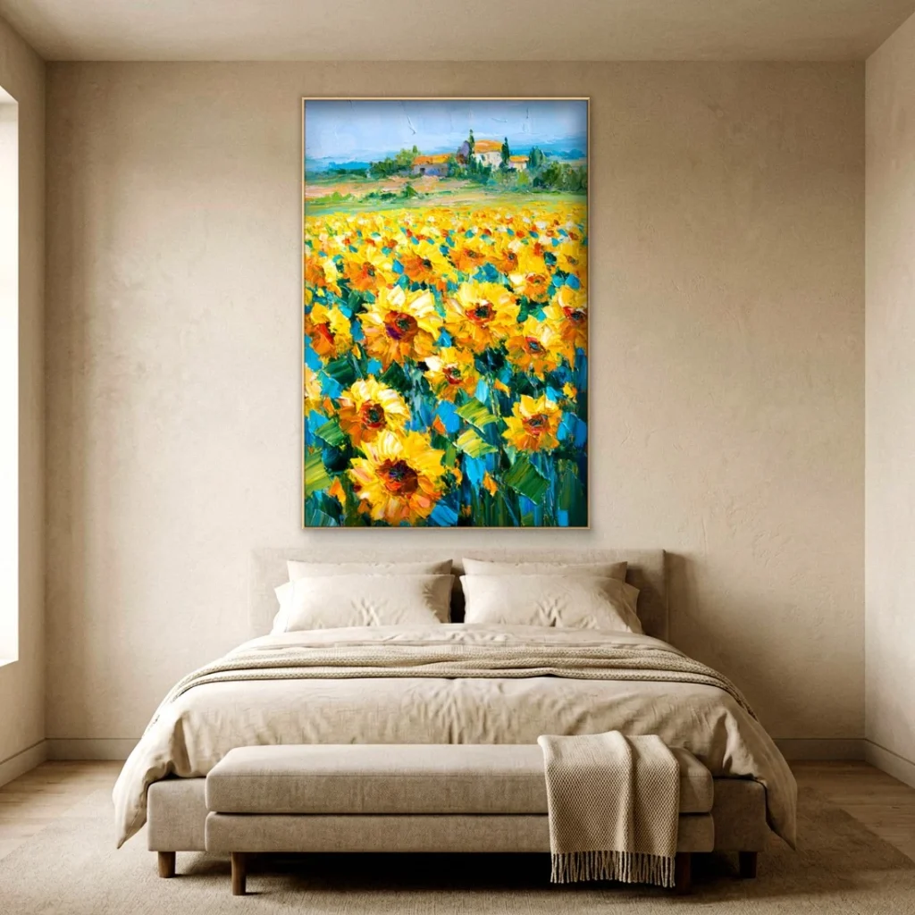 Sunflower field below a Tuscan farmhouse canvas in a bedroom
