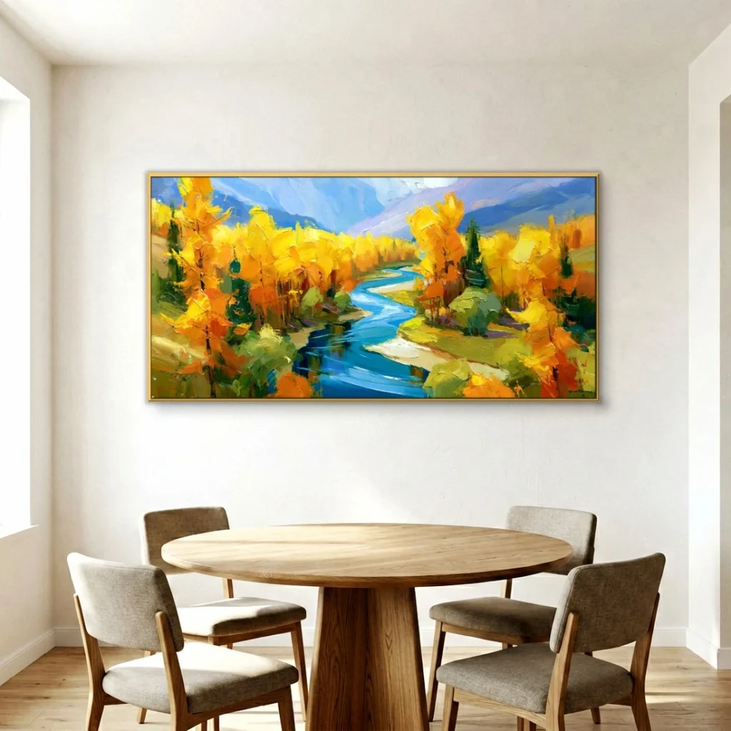 Golden fall countryside river valley wall art in a bright dining room