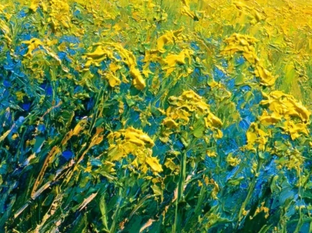 Extreme macro of one raised rapeseed bloom showing ridged cadmium-yellow oil paint and blue flecks, textured landscape IA109