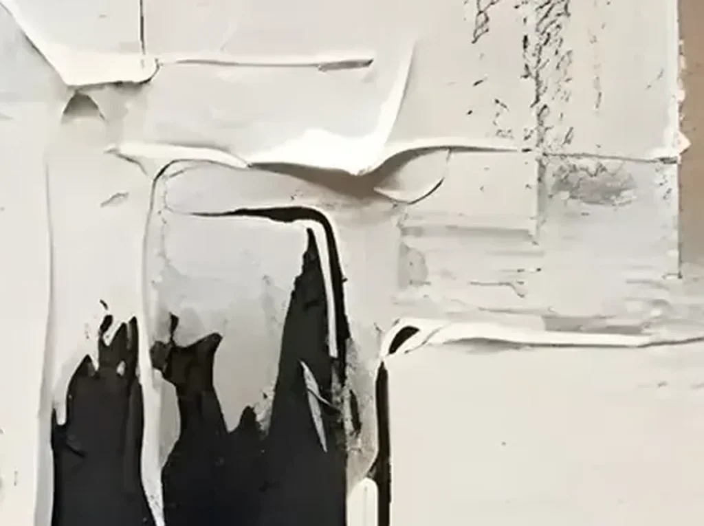Close-up of the black gesture crossing troweled ivory plaster on canvas TA08