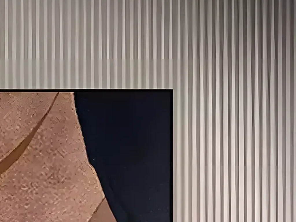 Detail crop of the grainy stone-like texture across the beige and dusty rose fields of wabi-sabi canvas WA12