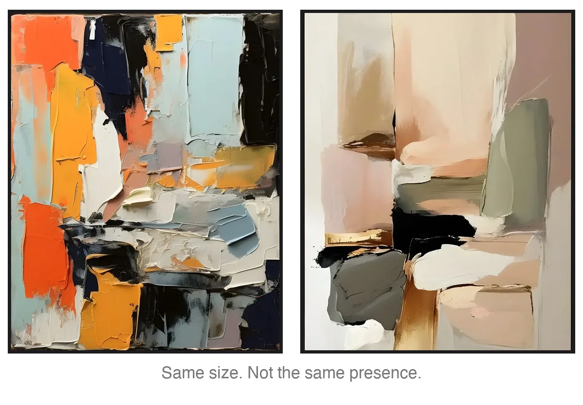 Two abstract paintings shown at exactly the same size side by side, one bold and dark, one soft and pale, showing how contrast changes how big the same wall art size feels in a room.