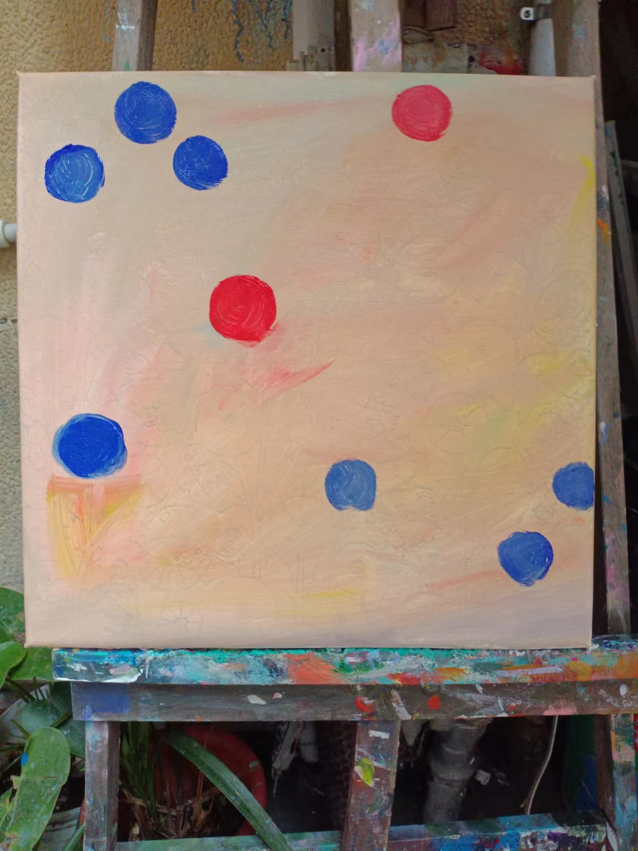 Early floral painting with drawn outlines and red and blue circles on a pale ground.