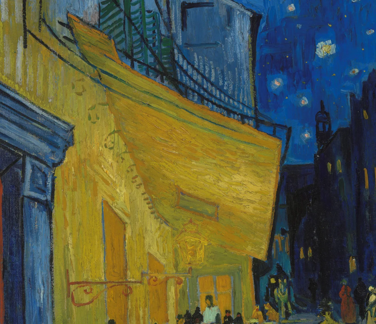 Detail of a Cafe Terrace at Night reproduction, showing yellow terrace light, blue paving, small tables, and a receding Arles street.