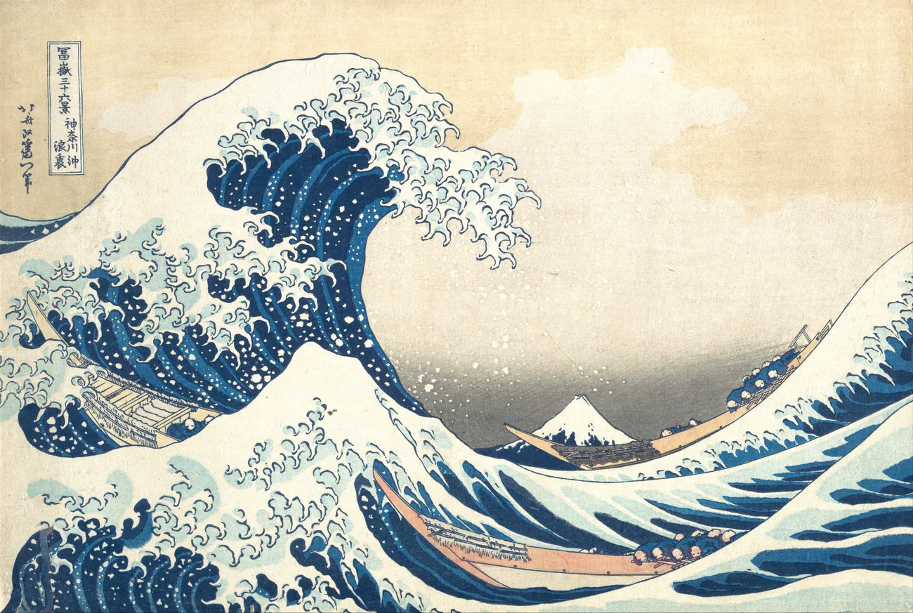 Katsushika Hokusai's The Great Wave off Kanagawa, with a curling blue wave above three boats and Mount Fuji in the distance.