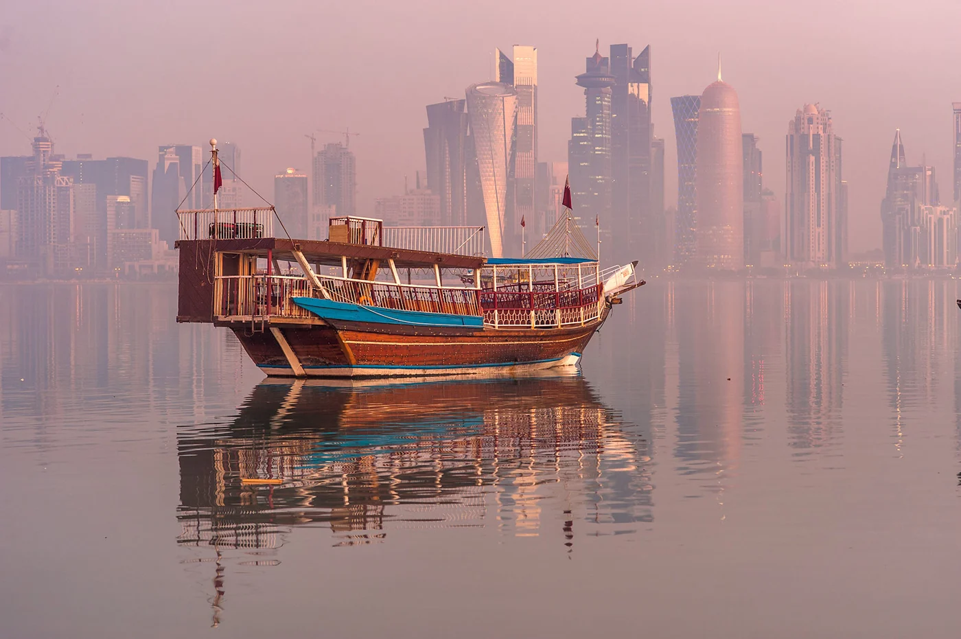 Dhow and waterfront skyline along Doha Corniche