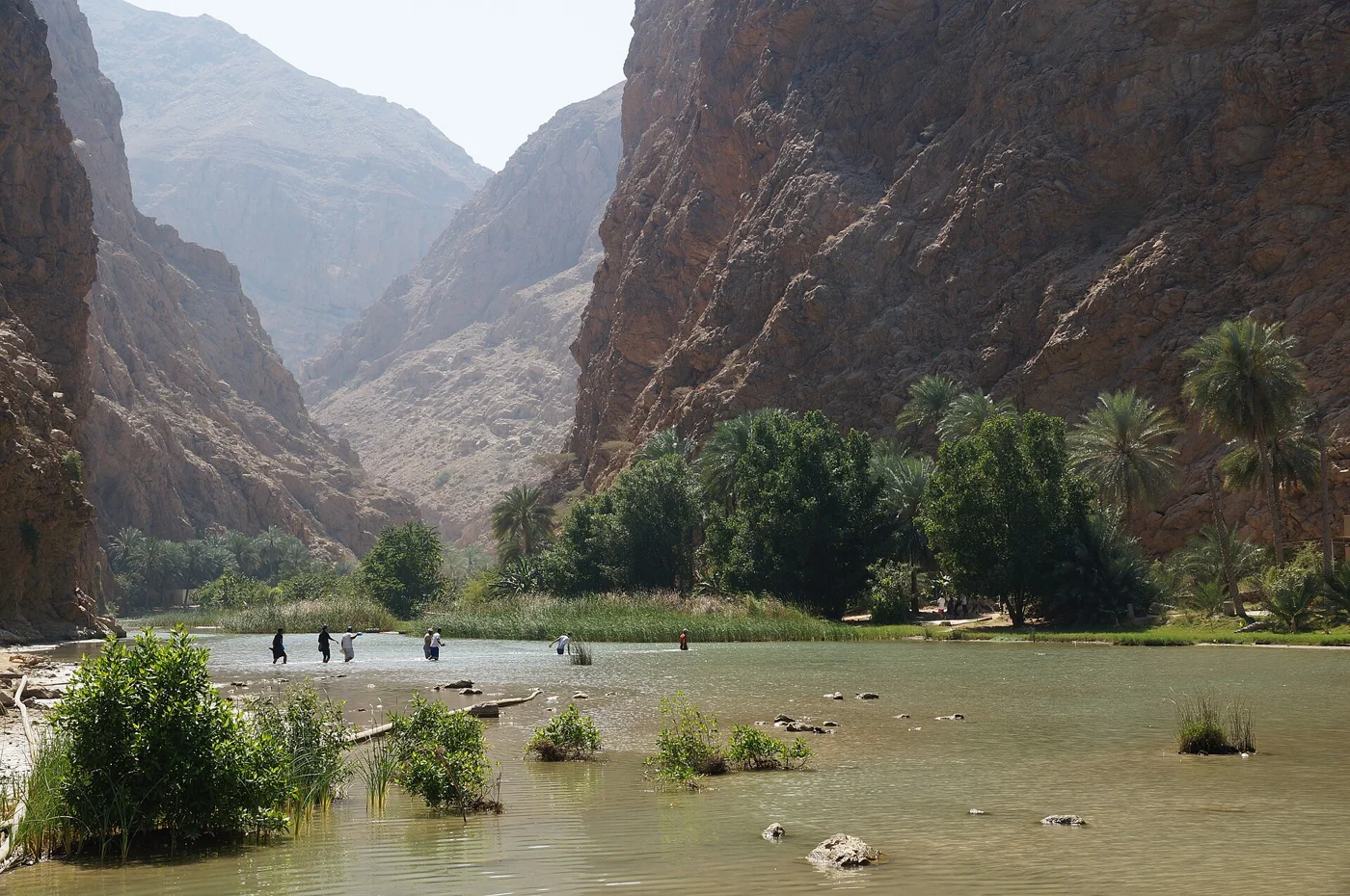 Water and limestone cliffs at Wadi Shab, Oman