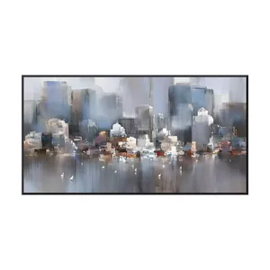 A large horizontal impressionist cityscape painting of slate blue and gray towers fading into fog above a low row of white, cream and rust buildings, reflected in streaked gray water with small white sailboats, in a black frame